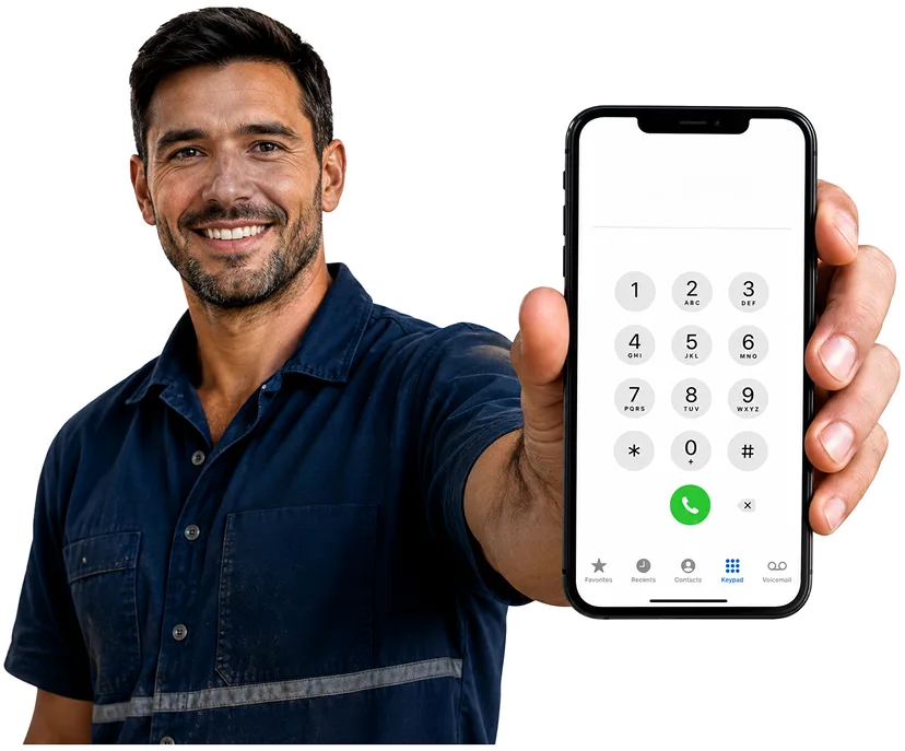 Plumber on the phone taking a Newtown callout